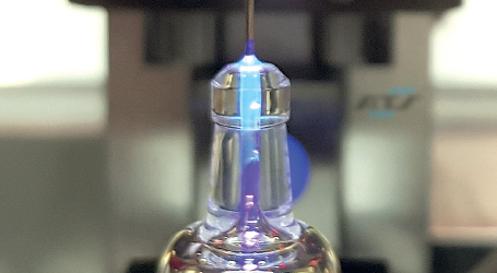 Bonding of a needle on a glass syringe body